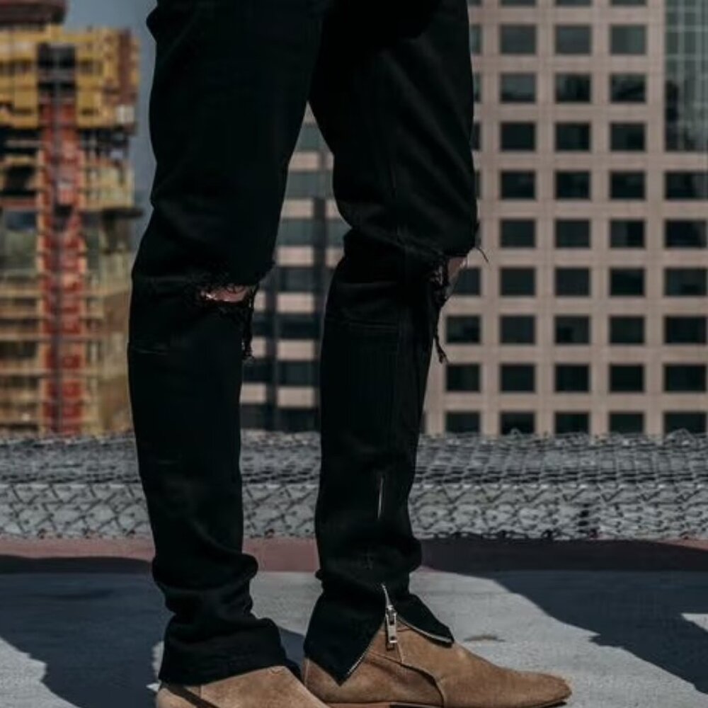 mnml black skinny jeans with ankle zip and ripped knees